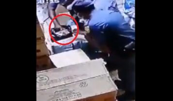 SAPS Police Officers stealing money from Ethiopian shop in Soweto, Johannesburg