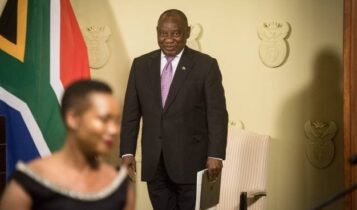 President Ramaphosa looks at Minister Stella Ndabeni-Abrahams during swearing in ceremony