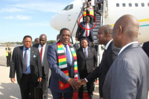 valdano-brown-holds mnangagwa bags