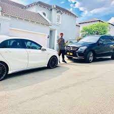 emtee cars and house