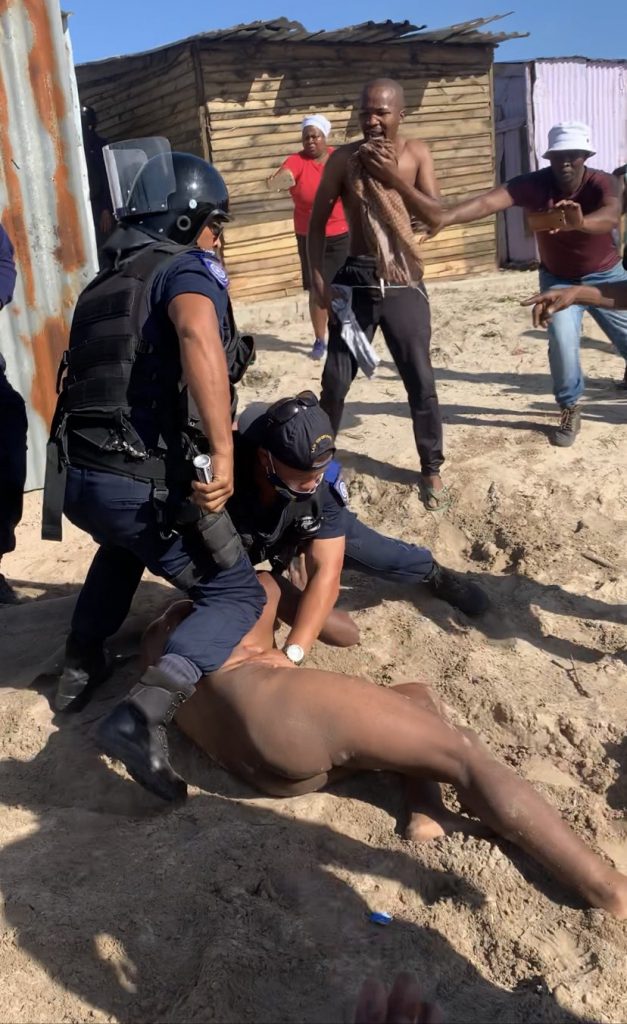 pepper spray cape town man evicted naked