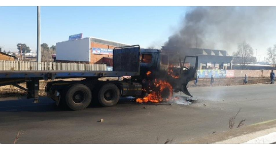 truck set fire south africa demonstration