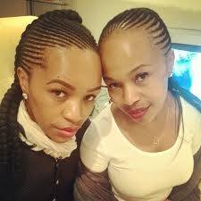 Does Sindi Dlathu have a twin sister?