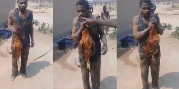 Video: Angry mob forces chicken thief to eat raw chicken