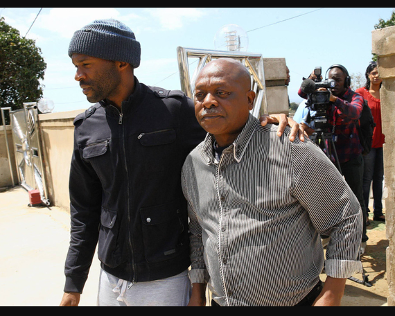 Senzo Meyiwa’s cousin, Siyabonga Miya, comforts his uncle Sam Meyiwa at the Meyiwa home in uMlazi a day after the goalkeeper was murdered. Picture: Patrick Mtolo/African News Agency/ANA