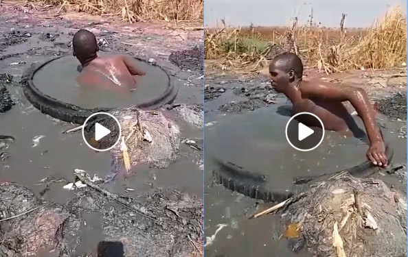 man unblocks sewage system