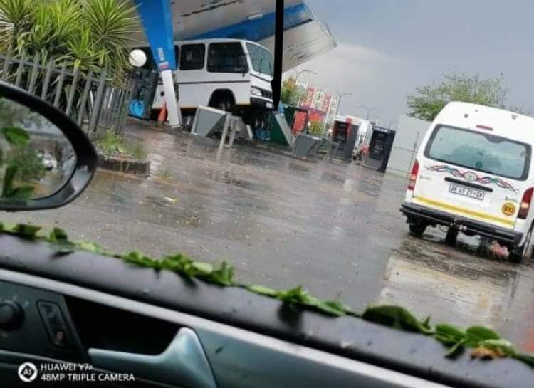 petrol station falls on buses South Africa