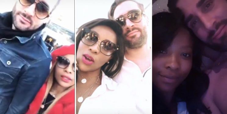 Pearl Modiadie and her partner, whom Getty Images has identified as Nathaniel Oppenheimer.