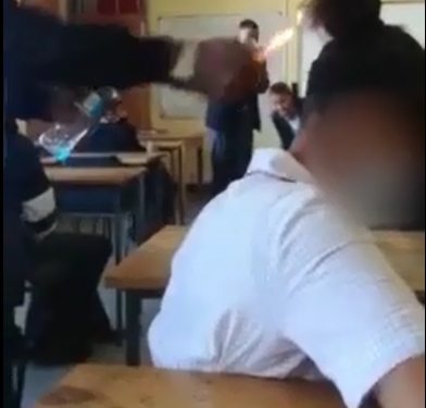 Watch Bully suspended after lighting girl’s hair on fire