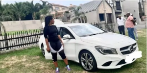 Enhle Mbali and her Mercedes Benz