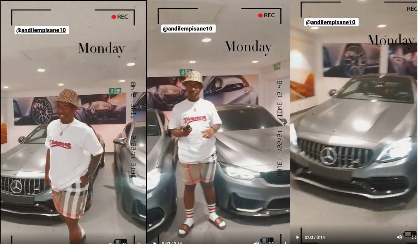 Andile Mpisane stands next to his Mercedes and Sithelo's BMW. Source - Instagram