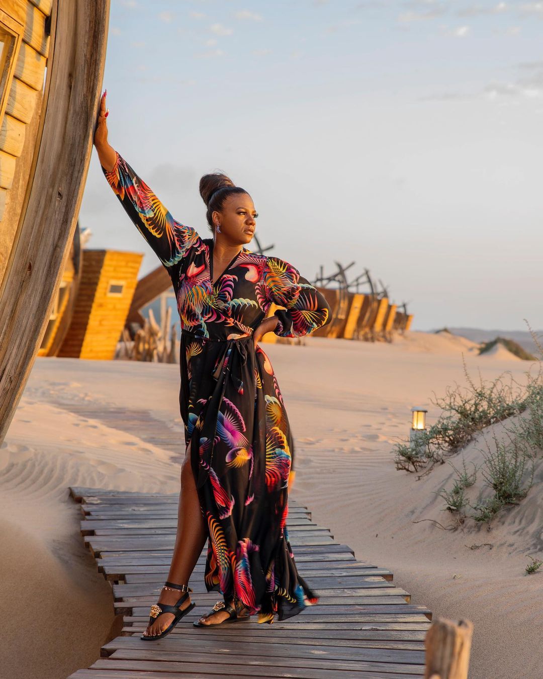 Shauwn Mkhize plays with a tiger, scaring her sister away