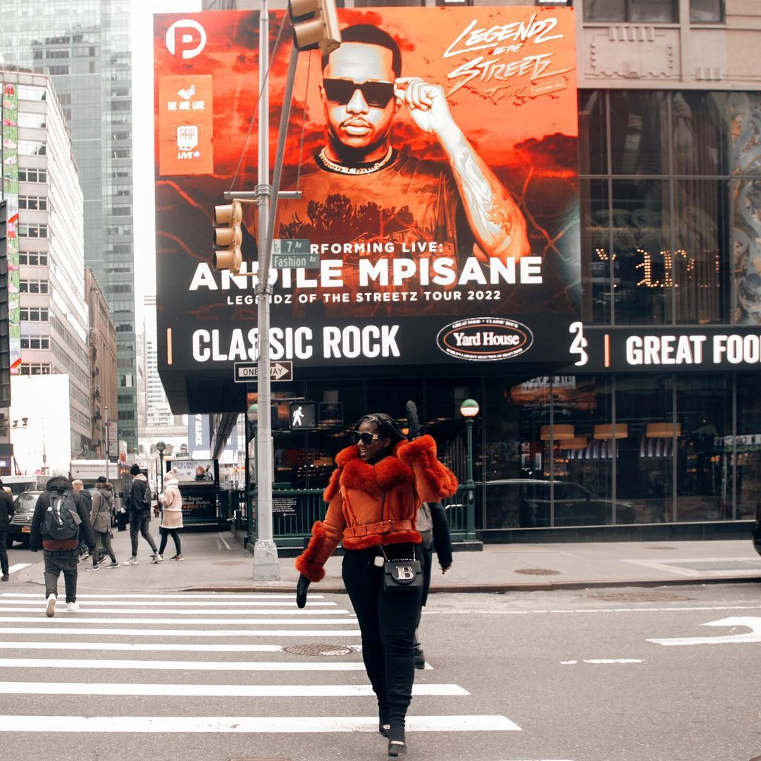 Shauwn Mkhize gushes over Andile Mpisane's face on a Time Square Billboard