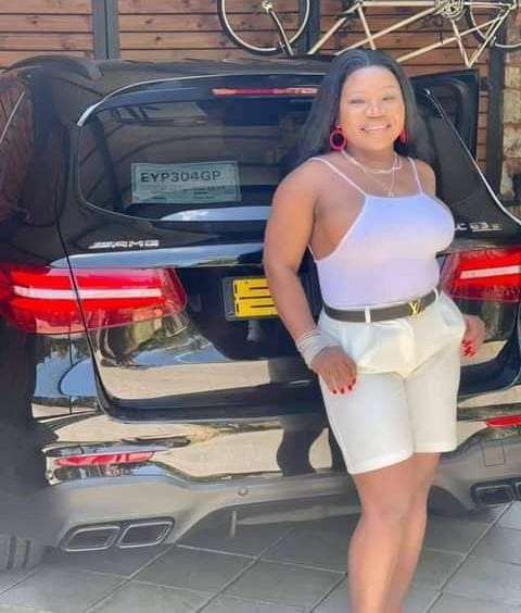 Makhadzi stands next to the car she received from Master KG on Valentine's