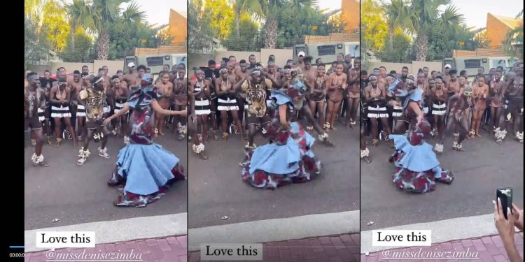 Denise Zimba dancing at her traditional wedding