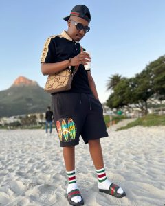 Watch as Reece Madlisa impresses with his all Gucci outfit at the beach in Cape Town