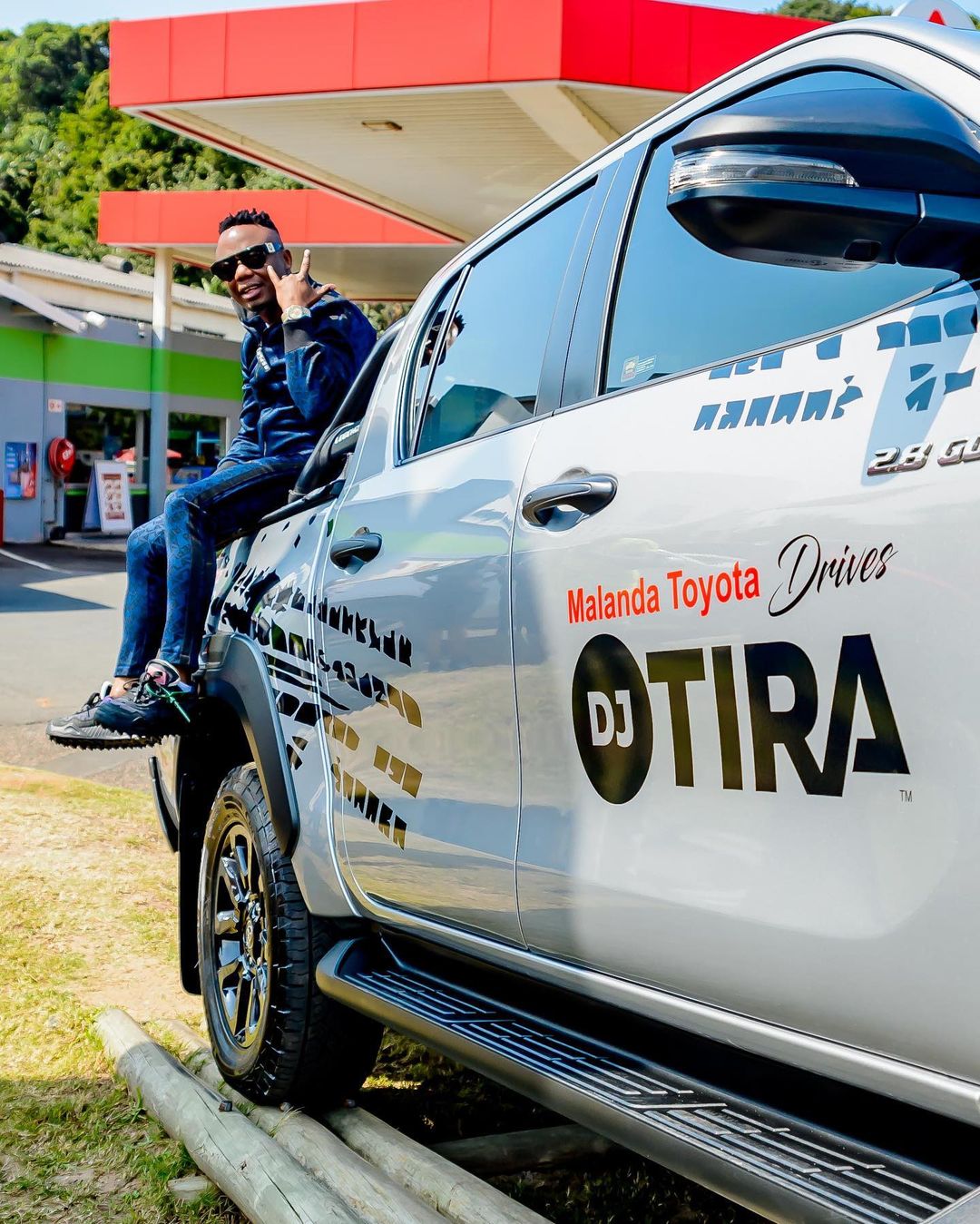 Dj Tira celebrates his new car, a Toyota Bakkie. Image: Instargam/DJ Tira
