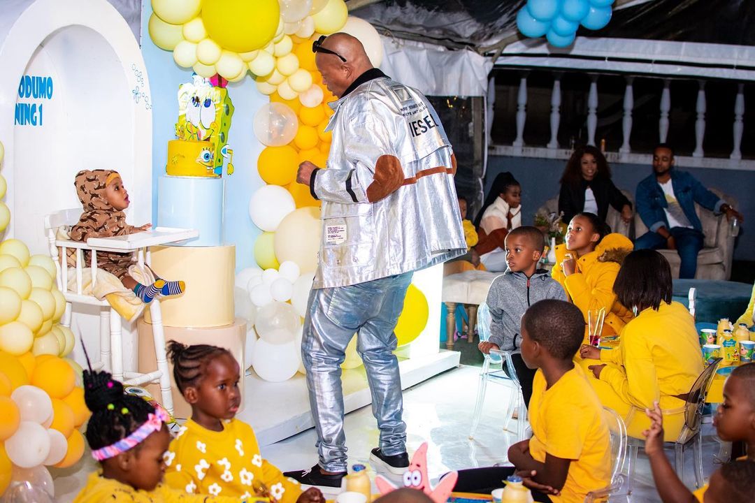 Mampintsha with his baby baby as they celebrate his first birthday party