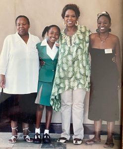 Thando Dlomo, her family and Oprah Winfrey