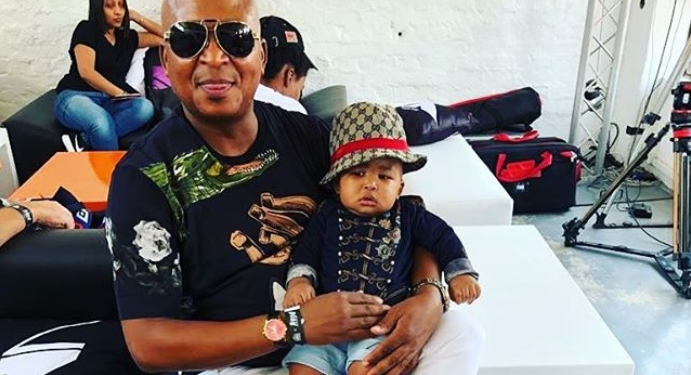 Remo Kunene and his dad Kenny in matching Dolce & Gabbana T-shirts.